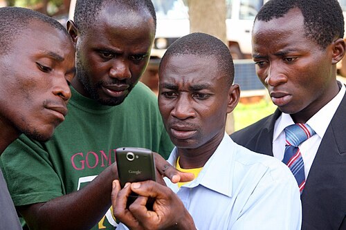 Forest monitors using smartphones in Tanzania — context photograph